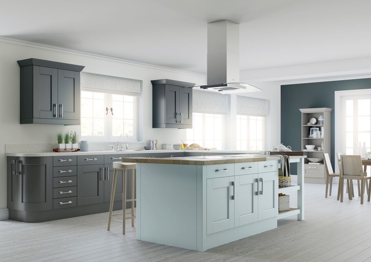 A dark blue shaker kitchen with a large island and white worktops