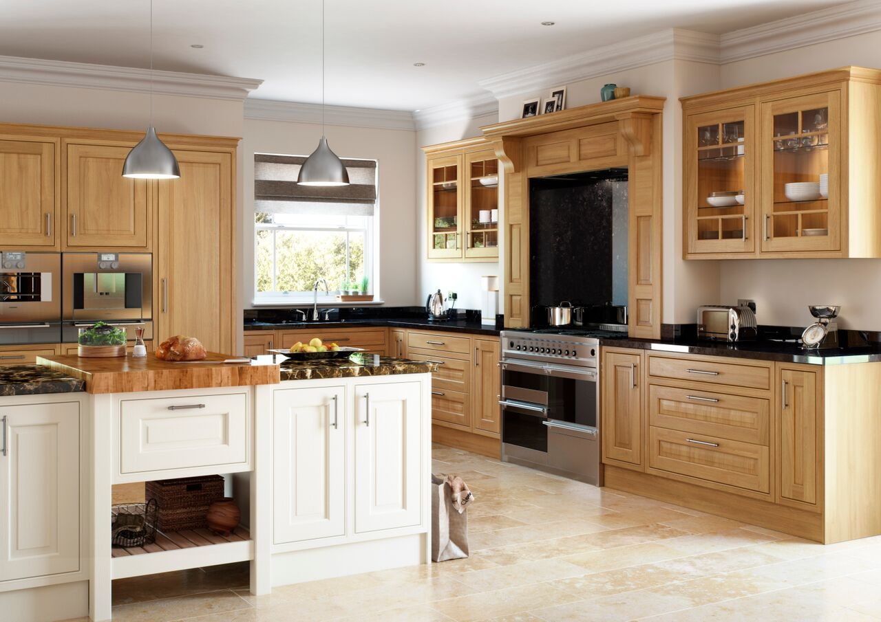 A solid oak kitchen with a large island and a range cooker